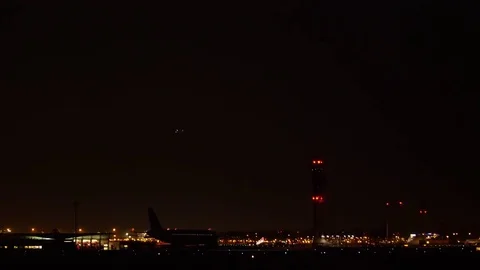 Airplane taxiing at night at airport. Stock Footage 81221362