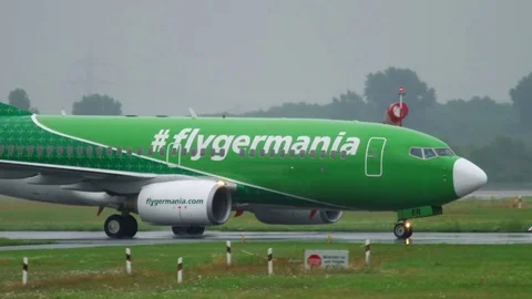 Airplane taxiing at rainy weather Stock Footage