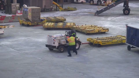Airplane terminal Services Workers on the ground fooling around  Stock Footage 107941436