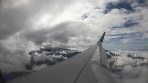 Airplane through the clouds Stock Footage 124274831