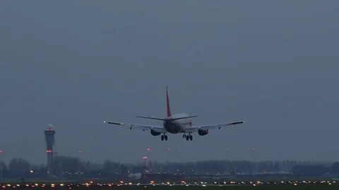 Airplane touchdown at night. Stock Footage 81221012