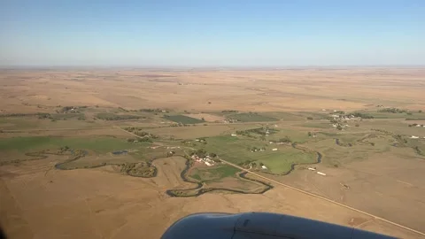 Airplane touching down at Rapid City South Dakota airport Stock-Footage 255969426