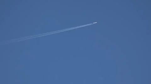 Airplane trail across the sky Video stock 259391473