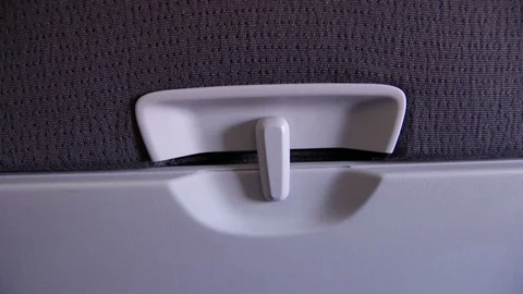 Airplane Tray Table Lock Closeup Stock Footage 89300607