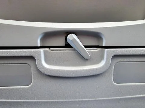 Airplane Tray Table on seat back Stock Photos