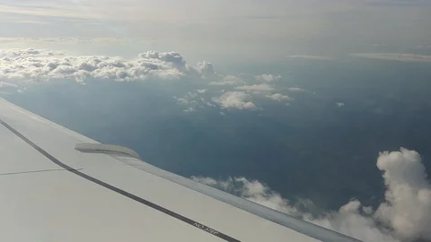 Airplane turbulence while landing through clouds Stock Footage 128929248