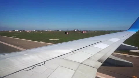 Airplane turns on ground Stock Footage 76884150