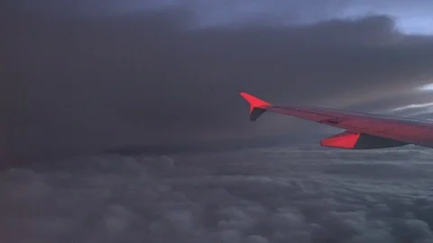 Airplane turns at night Stock Footage 114377889