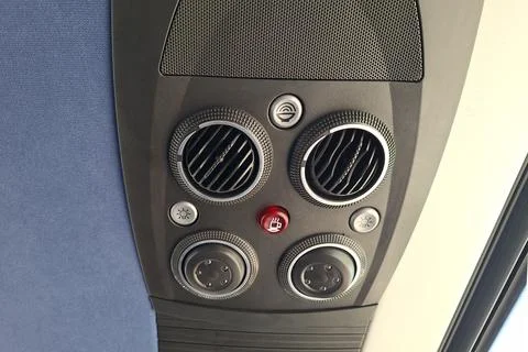 Airplane ventilation system with light and call button in passenger cabin Stock Photos