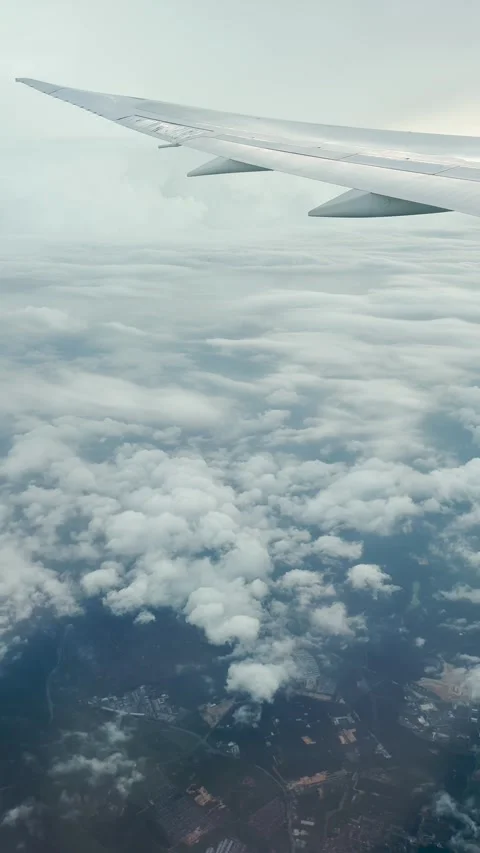 Airplane view above the clouds Stock Footage 305007192