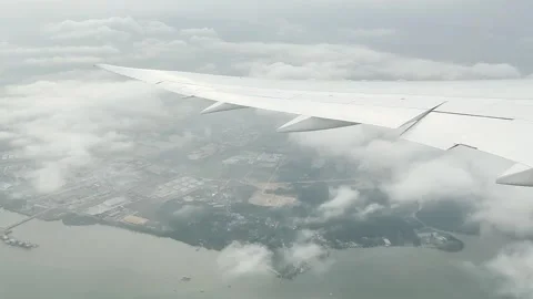 Airplane view of a city in the cloud Stock Footage 304554650