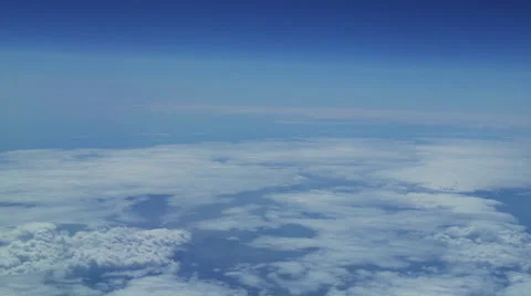 Airplane View of Clouds in the Stratosphere Stock Footage