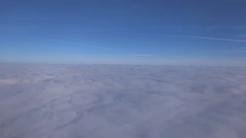 Airplane view over clouds Stock Footage 114560568