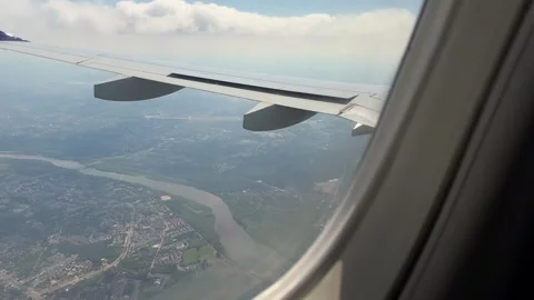 Airplane view over Polish landscape with river and suburbs near Warsaw Stock Footage 310677526