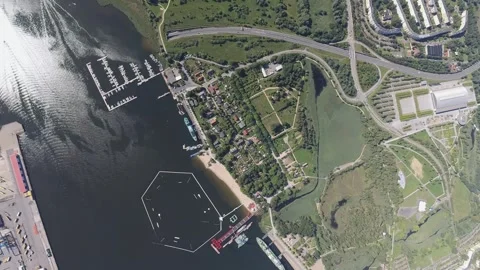 Airplane view of the water ski facility and the Warnow Tunnel in Rostock Stock Footage 248888237