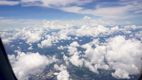 Airplane view from the window with clouds in sky Stock Footage 206770834