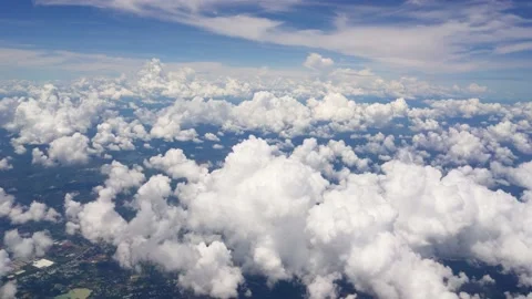 Airplane view from the window with clouds in sky Stock Footage 206771437