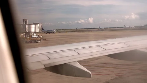 An Airplane waiting in the Runway Stock Footage 89606089