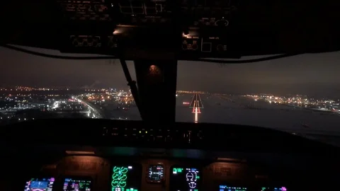 Airplane was touching down on the runway in airport at night of runway from i Stock Footage 100624757