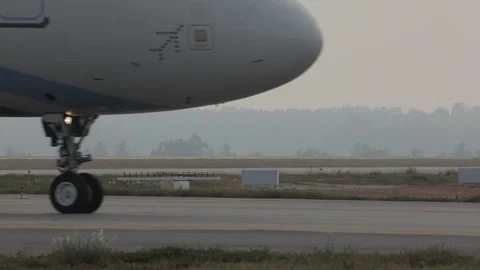 Airplane Wheel Rotation, Closeup Stock Footage 100052434