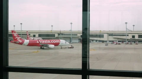 Airplane while ground handling service is working to pushback at Airport te.. Stock Footage 245328747
