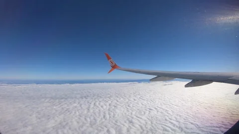 Airplane Window With Clouds Stock Footage 133055293