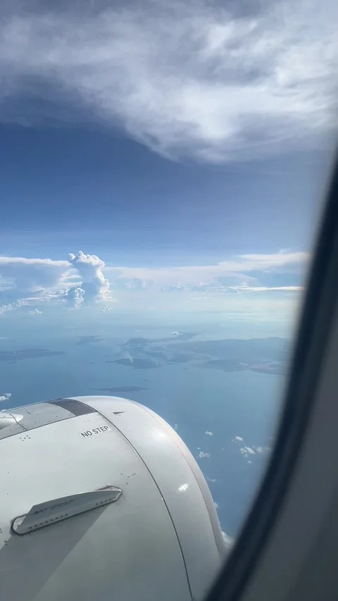 Airplane Window Clouds Islands Stock Footage 332633533