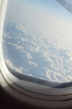 Airplane window a clouds 写真素材
