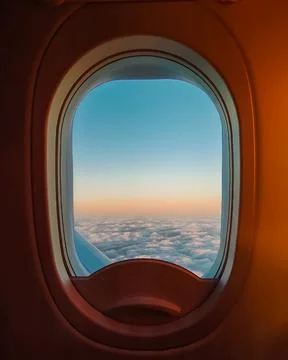 Airplane window at dawn Stock Photos