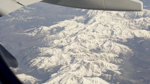 Airplane window mountains Stock Footage 264628018