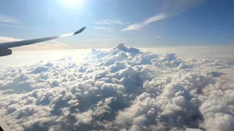 Airplane Window Perspectives of Cloud Formations Stock Footage 280114863