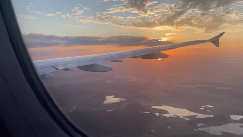 Airplane Window POV Flying Over Berlin Brandenburg Landscape at Sunset, Germany Stock Footage 339688237