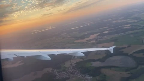 Airplane Window POV Flying Right Over Berlin Brandenburg Landscape at Sunset Stock Footage 339688257