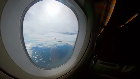 Airplane window seat side view from behind Stock-Footage 293775194