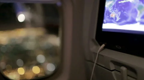 Airplane Window Seat - View of Los Angeles at Night and Wing of Plane on Flight, Stock Footage 44112283