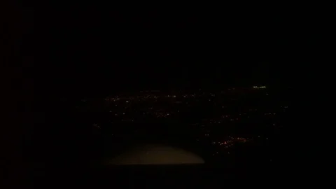 Airplane Window Seat - View of Los Angeles at Night and Wing of Plane on Flight 库存影片 81891523