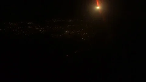 Airplane Window Seat - View of Los Angeles at Night and Wing of Plane on Flight Stock Footage 81893449