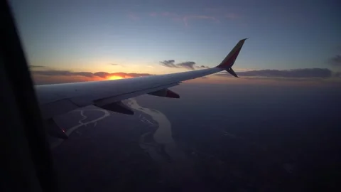 Airplane Window Sunset River Stock Footage