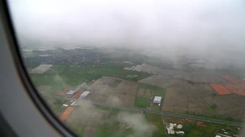 Airplane Window View Above the City Stock Footage 154263737