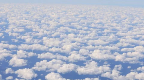 Airplane Window View, Above Clouds, Flying Stock Footage 47566641
