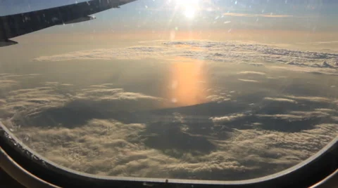 Airplane Window View, Above Clouds, Flying Stock Footage 47566779