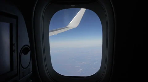 Airplane Window View, Above Clouds, Flying, Wing Outside Stock Footage 47567204