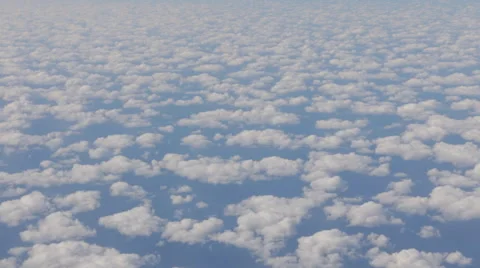 Airplane Window View, Above Clouds, Flying Stock Footage 47567326