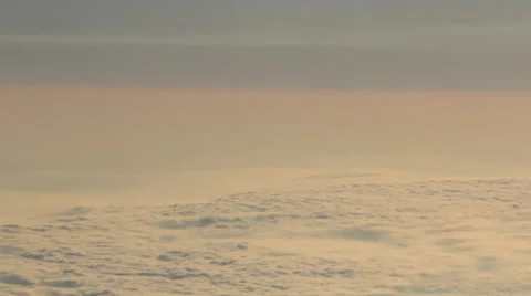 Airplane Window View, Above Clouds, Flying Stock Footage 47567338