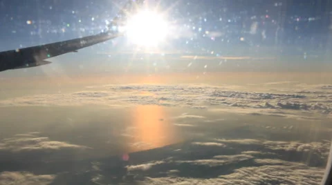 Airplane Window View, Above Clouds, Flying Stock Footage 47567370