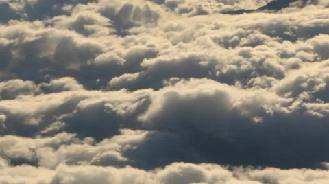 Airplane Window View, Above Clouds, Flying Stock Footage 47567605