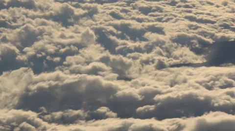 Airplane Window View, Above Clouds, Flying Stock Footage 47567853