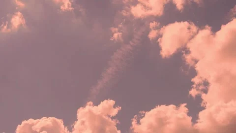 Airplane Window View, Beautiful Blue Sky Yellow Orange White Fluffy Clouds and S Stockbeeldmateriaal 332216622