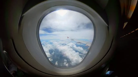 Airplane window view with beauty sky, clouds. Looking out the window of an .. Stock-Footage 293774592
