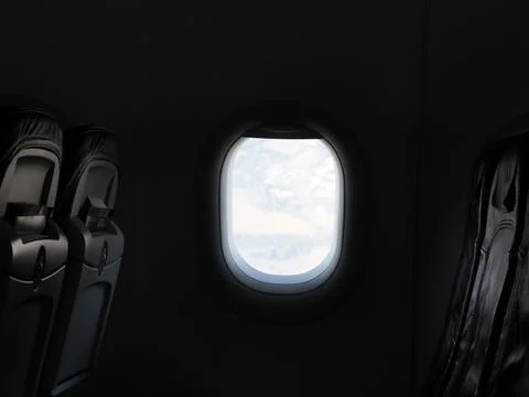 Airplane Window View with Clouds During Flight Stock Photos